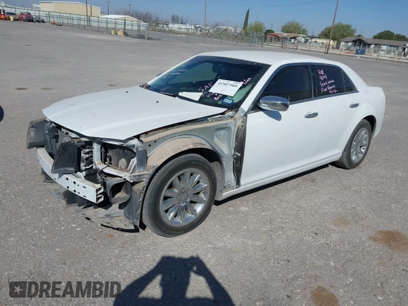 2014 Chrysler 300 with VIN 2C3CCAEG4EH312930, listed as a IAAI auction lot 41907509 with 128,940 mi miles. Bid and sale history available at carsss.com. Image 17.