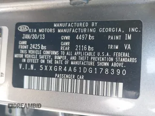 2013 Kia Optima SX with VIN 5XXGR4A61DG178390, listed as a IAAI auction lot 42212824 with 128,055 mi miles and . Bid and sale history available at DreamBid. Image 9.