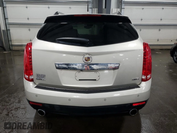 2014 Cadillac SRX Premium Collection с VIN 3GYFNDE3XES611363, выставлен на аукционе Copart как лот 50643475 с пробегом 57 749 миль миль и Списание • Salvage title. История ставок и продаж доступна на DreamBid. Изображение 6.