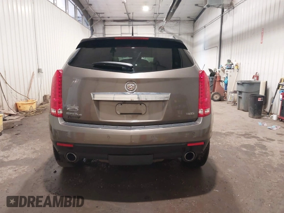 2014 Cadillac SRX Performance Collection z VIN 3GYFNFE38ES578066, wystawiony jako IAAI lot #42153023 z przebiegiem 134 009 mil mil oraz . Historia ofert i sprzedaży dostępna na DreamBid. Obrazek 17.