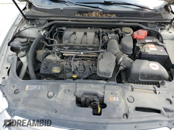 2013 Ford Taurus SEL with VIN 1FAHP2E81DG159721, listed as a Copart auction lot 52616535 with 136,677 mi miles and Salvage Title. Bid and sale history available at carsss.com. Image 11.