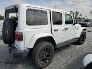2021 Jeep Wrangler Unlimited Sahara z VIN 1C4JJXP65MW766023, wystawiony jako Copart lot #52332735 z przebiegiem 23 130 mil mil oraz Nie do naprawy • Non repairable. Historia ofert i sprzedaży dostępna na DreamBid. Obrazek 3.