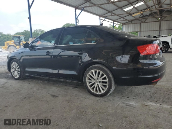 2012 Volkswagen Jetta SEL with VIN 3VWLX7AJ2CM409477, listed as a Copart auction lot 59476915 with 156,035 mi miles and Salvage title. Bid and sale history available at DreamBid. Image 2.