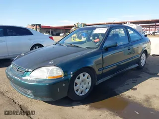 1998 Honda Civic EX with VIN 1HGEJ8240WL013387, listed as a IAAI auction lot 41302427 with 255,039 mi miles. Bid and sale history available at carsss.com. Image 17.