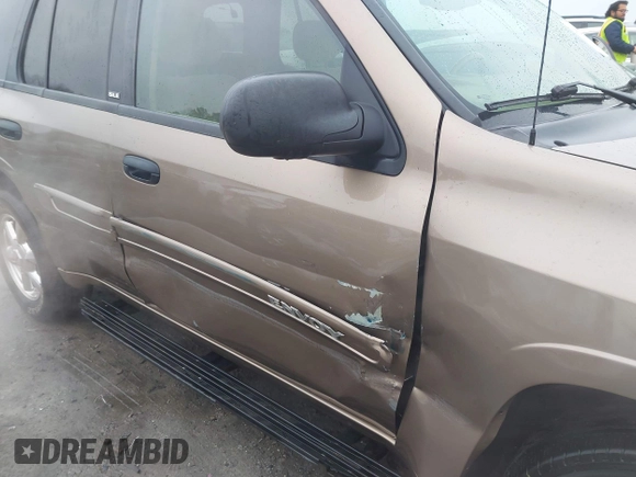 2003 GMC Envoy SLE with VIN 1GKDT13S332264984, listed as a IAAI auction lot 41523191 with 227,004 mi miles. Bid and sale history available at carsss.com. Image 6.