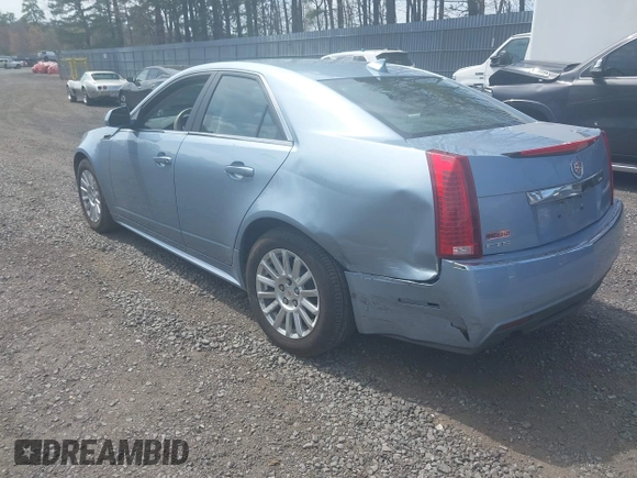 2013 Cadillac CTS Luxury with VIN 1G6DE5E58D0130850, listed as a IAAI auction lot 42085332 with 38,160 mi miles and . Bid and sale history available at DreamBid. Image 3.