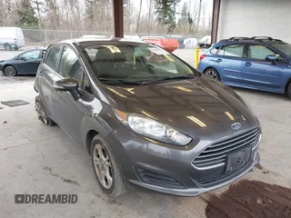 2016 Ford Fiesta SE with VIN 3FADP4EJ0GM150290, listed as a IAAI auction lot 41802899 with 126,778 mi miles. Bid and sale history available at carsss.com. Image 1.