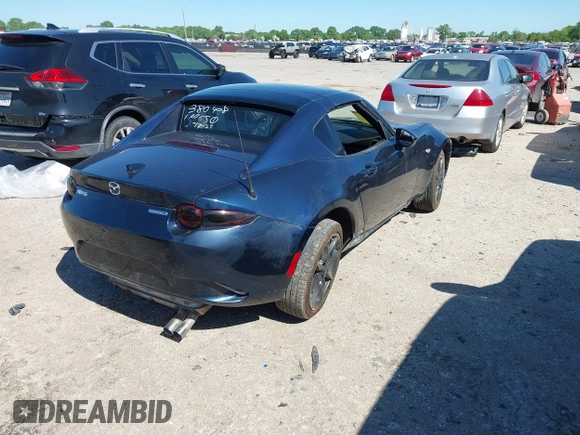 2021 Mazda MX-5 Miata Grand Touring with VIN JM1NDAM7XM0455743, listed as a IAAI auction lot 42067373 with 28,255 mi miles and . Bid and sale history available at DreamBid. Image 4.