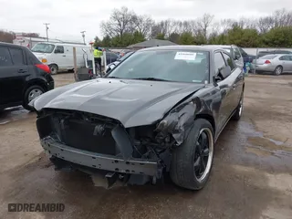 2014 Dodge Charger SE with VIN 2C3CDXBG8EH357664, listed as a IAAI auction lot 41860609 with 94,918 mi miles. Bid and sale history available at carsss.com. Image 6.