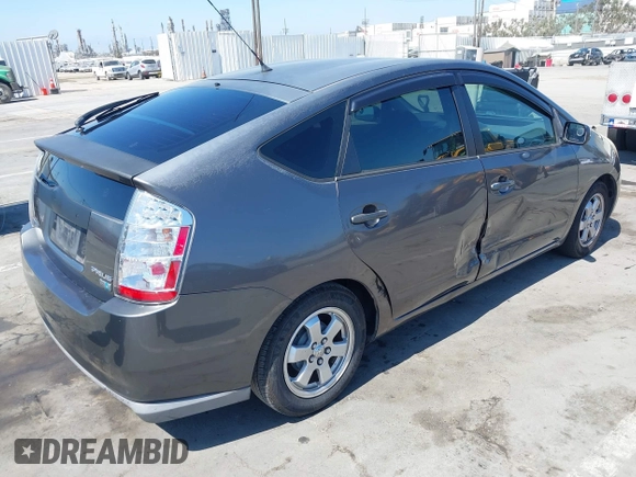 2007 Toyota Prius with VIN JTDKB20U073272767, listed as a IAAI auction lot 42520125 with 290,808 mi miles and . Bid and sale history available at DreamBid. Image 4.