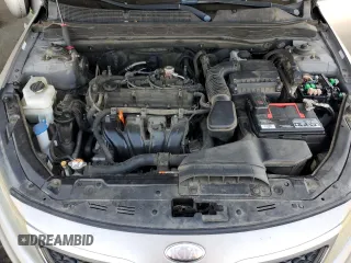 2013 Kia Optima LX z VIN 5XXGM4A74DG156035, wystawiony jako Copart lot #59358245 z przebiegiem 136 540 mil mil oraz Szkoda całkowita • Salvage title. Historia ofert i sprzedaży dostępna na DreamBid. Obrazek 11.