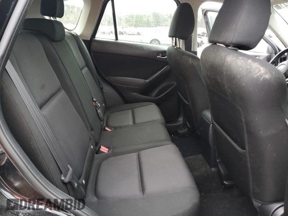 2014 Mazda CX-5 Sport with VIN JM3KE2BEXE0378744, listed as a Copart auction lot 86397414 with 101,011 mi miles and Salvage Title. Bid and sale history available at carsss.com. Image 11.