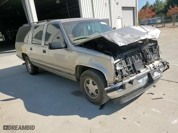 1999 GMC Suburban with VIN 3GKEC16R7XG542862, listed as a Copart auction lot 77568734 with 251,717 mi miles and Salvage Title. Bid and sale history available at carsss.com. Image 11.