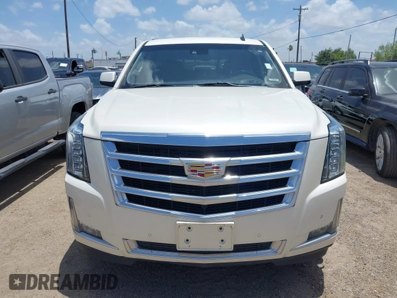 2015 Cadillac Escalade Luxury z VIN 1GYS4BKJ1FR215223, wystawiony jako IAAI lot #42548931 z przebiegiem 145 947 mil mil oraz . Historia ofert i sprzedaży dostępna na DreamBid. Obrazek 6.