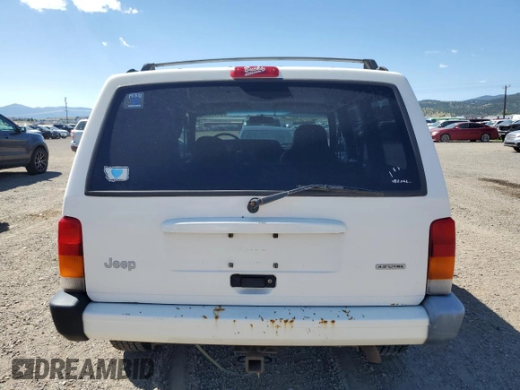 2000 Jeep Cherokee with VIN 1J4FF48S6YL169224, listed as a Copart auction lot 64411145 with 237,553 mi miles and Clean title. Bid and sale history available at DreamBid. Image 6.