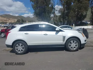 2015 Cadillac SRX Luxury Collection with VIN 3GYFNBE38FS584296, listed as a IAAI auction lot 41950092 with 56,691 mi miles and . Bid and sale history available at carsss.com. Image 14.