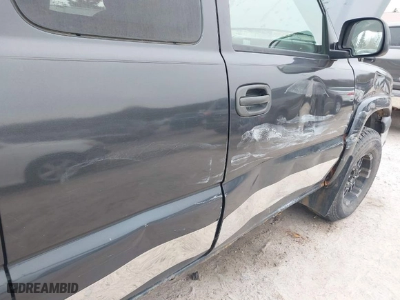 2003 Chevrolet Silverado 1500 LS with VIN 2GCEK19T131198891, listed as a IAAI auction lot 41984062 with 179,986 mi miles. Bid and sale history available at carsss.com. Image 14.