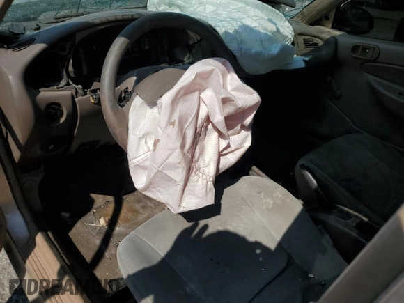 1999 Ford Escort SE z VIN 1FAFP13P7XW177713, wystawiony jako Copart lot #70439304 z przebiegiem 125 781 mil mil oraz Szkoda całkowita • Salvage title. Historia ofert i sprzedaży dostępna na DreamBid. Obrazek 8.
