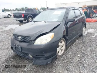2004 Toyota Matrix Std with VIN 2T1KR32E44C207298, listed as a IAAI auction lot 40333656 with 176,428 mi miles. Bid and sale history available at carsss.com. Image 6.