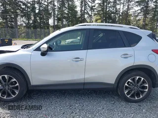 2016 Mazda CX-5 Grand Touring with VIN JM3KE4DYXG0647802, listed as a IAAI auction lot 41996854 with 85,774 mi miles. Bid and sale history available at carsss.com. Image 14.