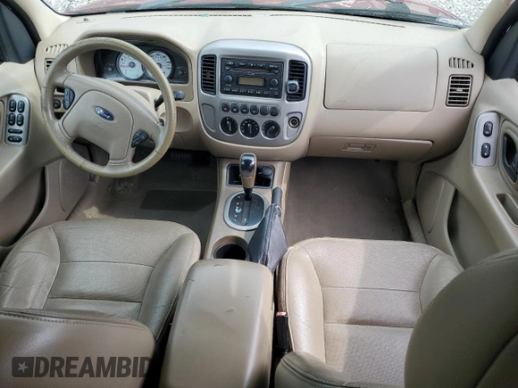 2005 Ford Escape Limited with VIN 1FMYU04165KA33277, listed as a Copart auction lot 54407625 with 217,317 mi miles and Salvage title. Bid and sale history available at DreamBid. Image 8.