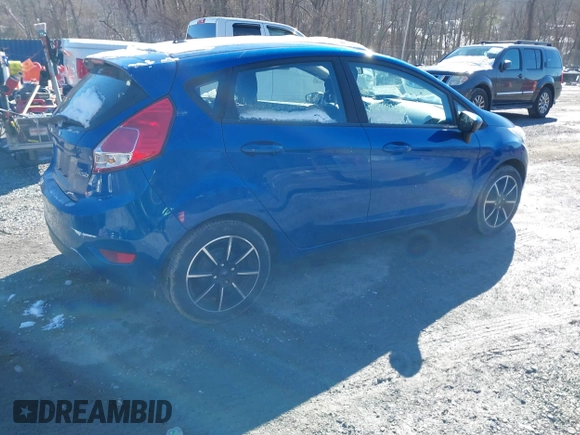 2018 Ford Fiesta SE with VIN 3FADP4EJ2JM143932, listed as a IAAI auction lot 41625049 with 70,237 mi miles. Bid and sale history available at carsss.com. Image 4.