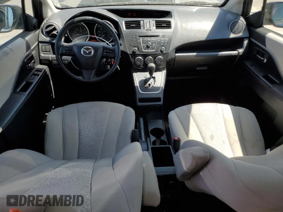 2012 Mazda 5 Sport with VIN JM1CW2BL0C0103969, listed as a Copart auction lot 64404424 with 133,398 mi miles and Salvage Title. Bid and sale history available at DreamBid. Image 8.