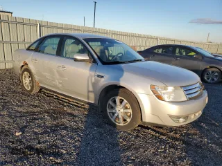 2009 Ford Taurus SEL with VIN 1FAHP24W79G103208, listed as a Copart auction lot 77621914 with 231,659 mi miles and Salvage Title. Bid and sale history available at carsss.com. Image 4.