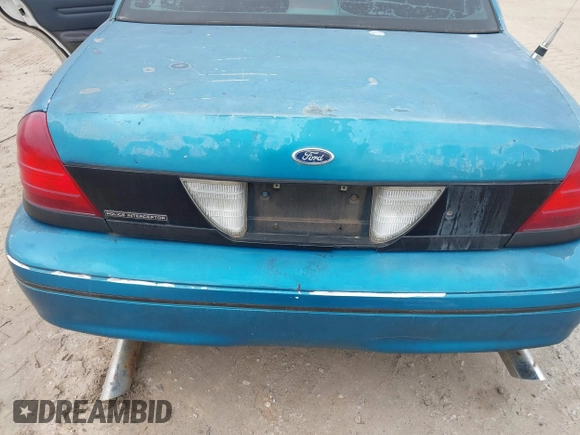 2000 Ford Crown Victoria Police Interceptor z VIN 2FAFP71W4YX136846, wystawiony jako IAAI lot #41715363 z przebiegiem 335 956 mil mil oraz . Historia ofert i sprzedaży dostępna na DreamBid. Obrazek 17.