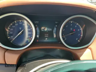 2014 Maserati Ghibli z VIN ZAM57XSA7E1126742, wystawiony jako Copart lot #57495135 z przebiegiem 50 077 mil mil oraz Szkoda całkowita • Salvage title. Historia ofert i sprzedaży dostępna na DreamBid. Obrazek 9.