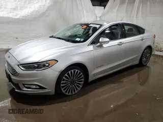 2017 Ford Fusion Hybrid Titanium with VIN 3FA6P0RU7HR383920, listed as a Copart auction lot 56320585 with 20,446 mi miles and Non repairable. Bid and sale history available at DreamBid. Image 1.