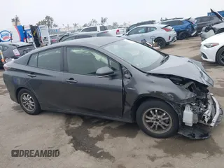 2016 Toyota Prius Two z VIN JTDKBRFU2G3508593, wystawiony jako IAAI lot #42248961 z przebiegiem 54 043 mil mil oraz . Historia ofert i sprzedaży dostępna na DreamBid. Obrazek 14.