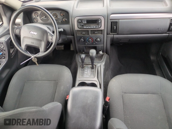 2004 Jeep Grand Cherokee Laredo with VIN 1J4GW48S84C200259, listed as a Copart auction lot 51002325 with 158,193 mi miles and Salvage Title. Bid and sale history available at carsss.com. Image 8.