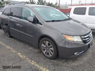 2016 Honda Odyssey Touring Elite with VIN 5FNRL5H94GB002361, listed as a IAAI auction lot 41781457 with 131,610 mi miles. Bid and sale history available at carsss.com. Image 1.