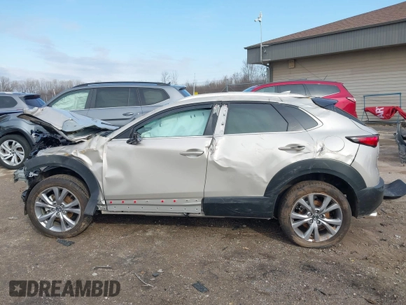 2023 Mazda CX-30 S Premium with VIN 3MVDMBDMXPM563500, listed as a IAAI auction lot 42092423 with 9,148 mi miles and . Bid and sale history available at DreamBid. Image 15.