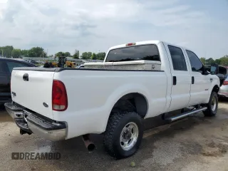 2004 Ford Super Duty F-250 XL with VIN 1FTNW21P14EA23582, listed as a Copart auction lot 62658954 with 205,382 mi miles and Salvage Title. Bid and sale history available at carsss.com. Image 3.