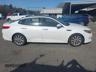 2016 Kia Optima EX with VIN 5XXGU4L32GG070138, listed as a IAAI auction lot 42138810 with 131,040 mi miles. Bid and sale history available at carsss.com. Image 13.