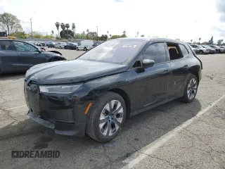 2025 BMW iX xDrive50 with VIN WB523CF00SCT18853, listed as a Copart auction lot 51282705 with 0 mi miles and Salvage Title. Bid and sale history available at carsss.com. Image 1.