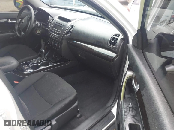 2014 Kia Sorento LX with VIN 5XYKT3A66EG486609, listed as a IAAI auction lot 42040281 with Not Provided miles and . Bid and sale history available at DreamBid. Image 5.
