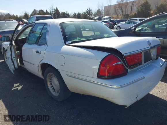 2002 Mercury Grand Marquis LS Premium z VIN 2MEFM75W92X641347, wystawiony jako IAAI lot #41701179 z przebiegiem 79 942 mil mil oraz . Historia ofert i sprzedaży dostępna na DreamBid. Obrazek 3.