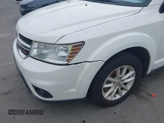 2017 Dodge Journey SXT with VIN 3C4PDCBG4HT572573, listed as a IAAI auction lot 42036006 with 209,854 mi miles and . Bid and sale history available at DreamBid. Image 18.