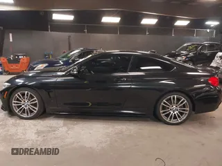 2015 BMW 4 Series 428i z VIN WBA3N3C59FK234025, wystawiony jako IAAI lot #42301785 z przebiegiem 66 729 mil mil oraz . Historia ofert i sprzedaży dostępna na DreamBid. Obrazek 14.