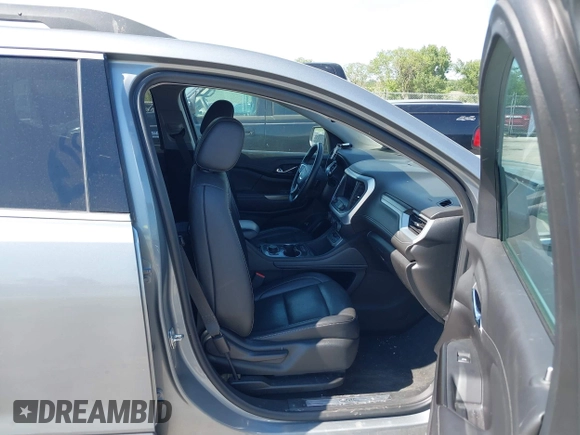 2023 GMC Acadia SLT with VIN 1GKKNML46PZ130813, listed as a IAAI auction lot 42614040 with 56,086 mi miles and . Bid and sale history available at DreamBid. Image 5.