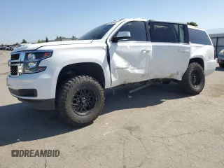 2018 Chevrolet Suburban LT with VIN 1GNSCHKC1JR330045, listed as a Copart auction lot 56246955 with 113,300 mi miles and Salvage title. Bid and sale history available at DreamBid. Image 1.