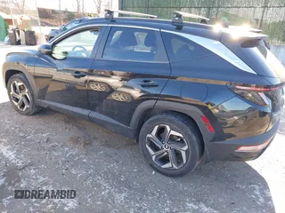 2022 Hyundai Tucson SEL Convenience with VIN KM8JFCA12NU039907, listed as a IAAI auction lot 41164495 with 60,466 mi miles and . Bid and sale history available at carsss.com. Image 3.
