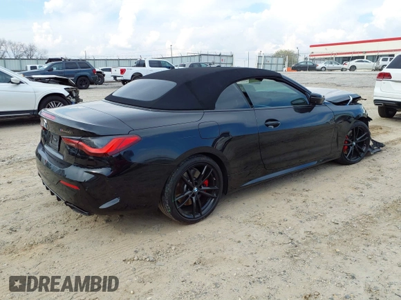 2021 BMW 4 Series M440i with VIN WBA53AT07MCH13853, listed as a IAAI auction lot 41788733 with 53,518 mi miles and . Bid and sale history available at DreamBid. Image 4.