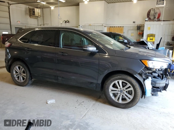 2019 Ford Edge SEL with VIN 2FMPK4J95KBB14991, listed as a Copart auction lot 60068825 with 68,850 mi miles and Salvage title. Bid and sale history available at DreamBid. Image 4.