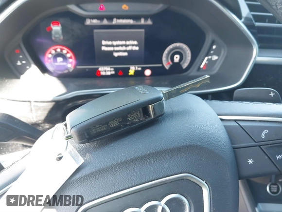 2021 Audi Q3 S line Premium Plus with VIN WA1EECF3XM1133790, listed as a IAAI auction lot 41870016 with 43,794 mi miles and . Bid and sale history available at DreamBid. Image 11.