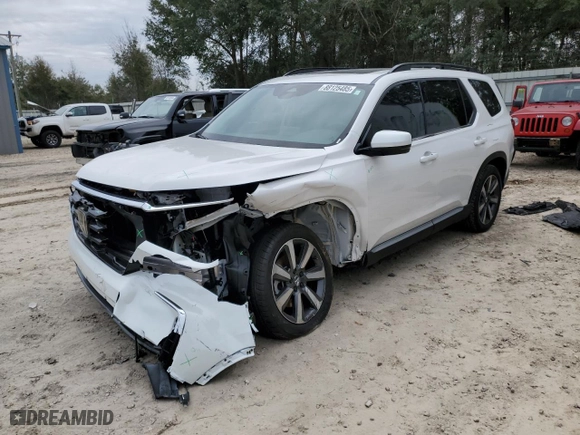 2025 Honda Pilot Touring with VIN 5FNYG2H76SB007454, listed as a Copart auction lot 88125485 with 10,065 mi miles and Salvage Title. Bid and sale history available at carsss.com. Image 1.