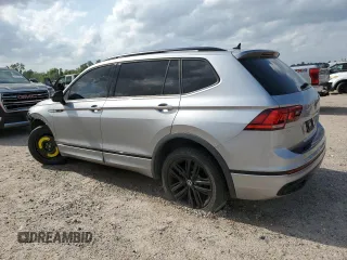 2022 Volkswagen Tiguan SE R-Line Black with VIN 3VVCB7AX6NM140264, listed as a Copart auction lot 55124815 with 28,340 mi miles and Salvage title. Bid and sale history available at DreamBid. Image 2.